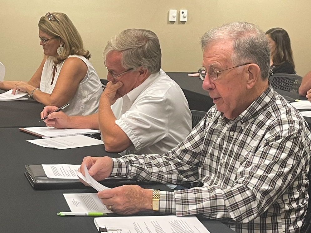 District 3 Councilman John Hinton (far right) speaks during a Council Committee meeting on Monday. 