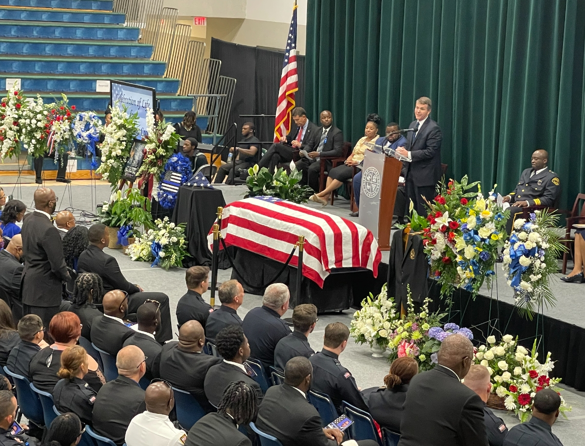 Tuscaloosa Mayor Walt Maddox speaks during the public celebration of life at Shelton State Community College on Saturday. 