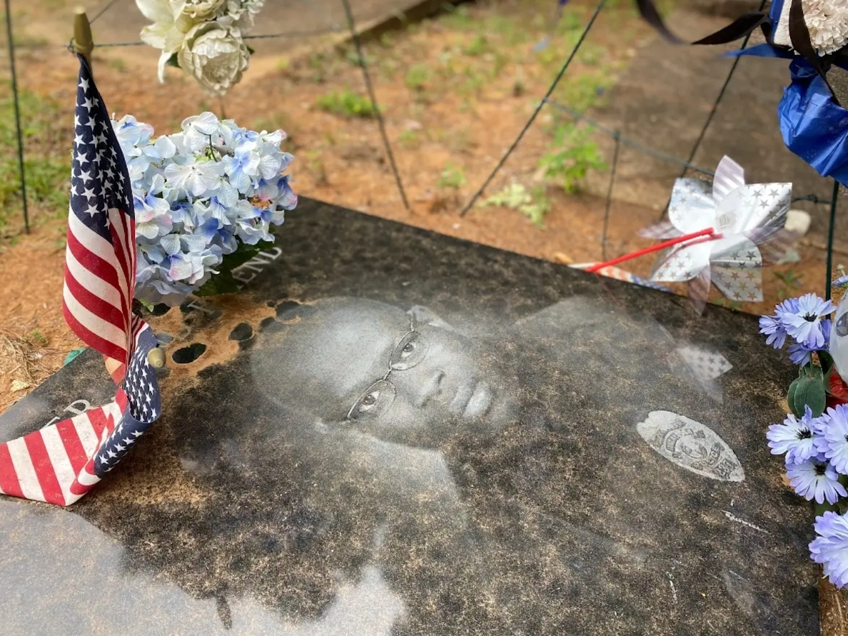 The headstone marking the grave for Tuscaloosa Police officer Dornell Cousette, who was killed in the line of duty during a shootout on Sept. 16, 2019. 
