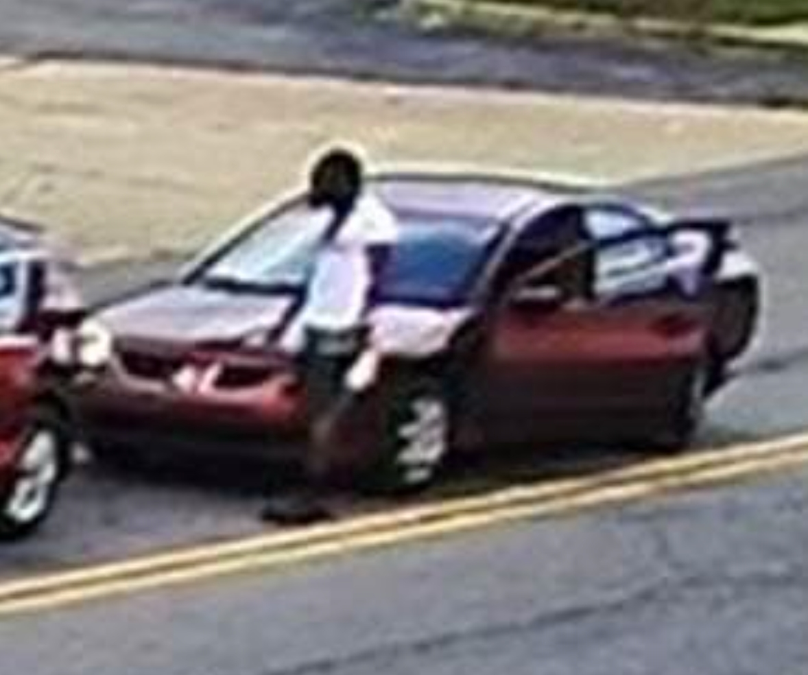 A security camera photo of the suspect involved in the hit-and-run