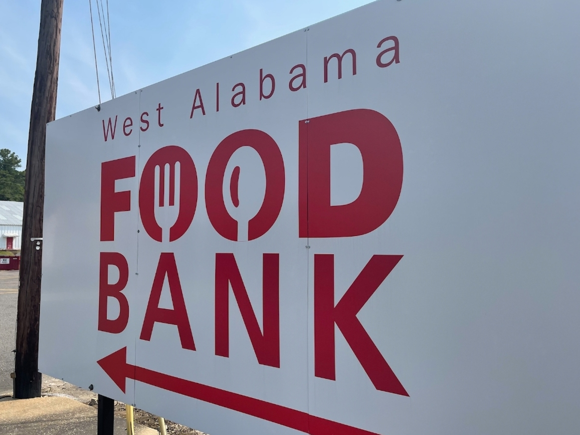 The sign outside of the food bank's old location in Northport