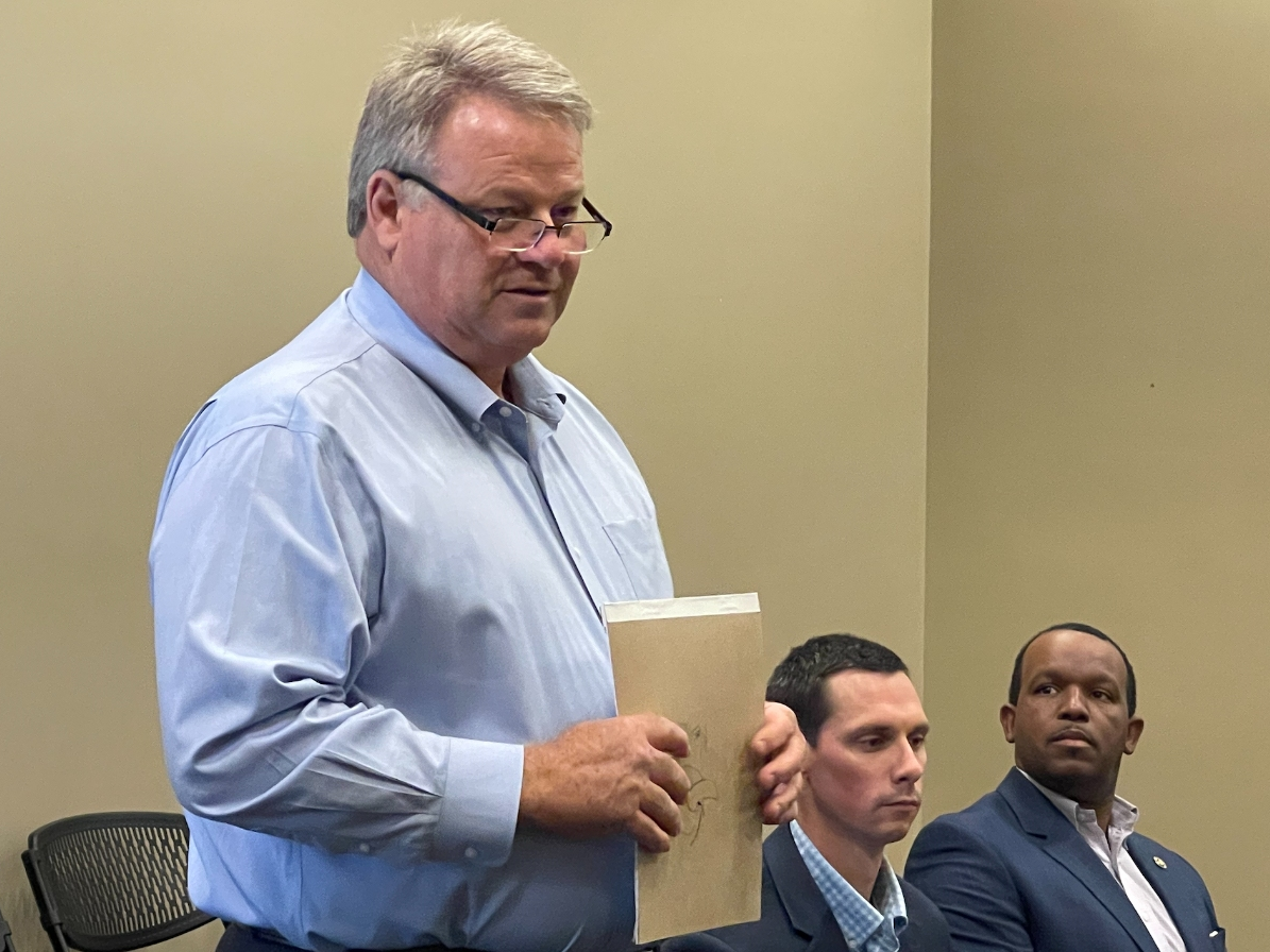 PARA Executive Director Gary Minor (left) addresses members of the Northport City Council's Finance Committee on Thursday. 