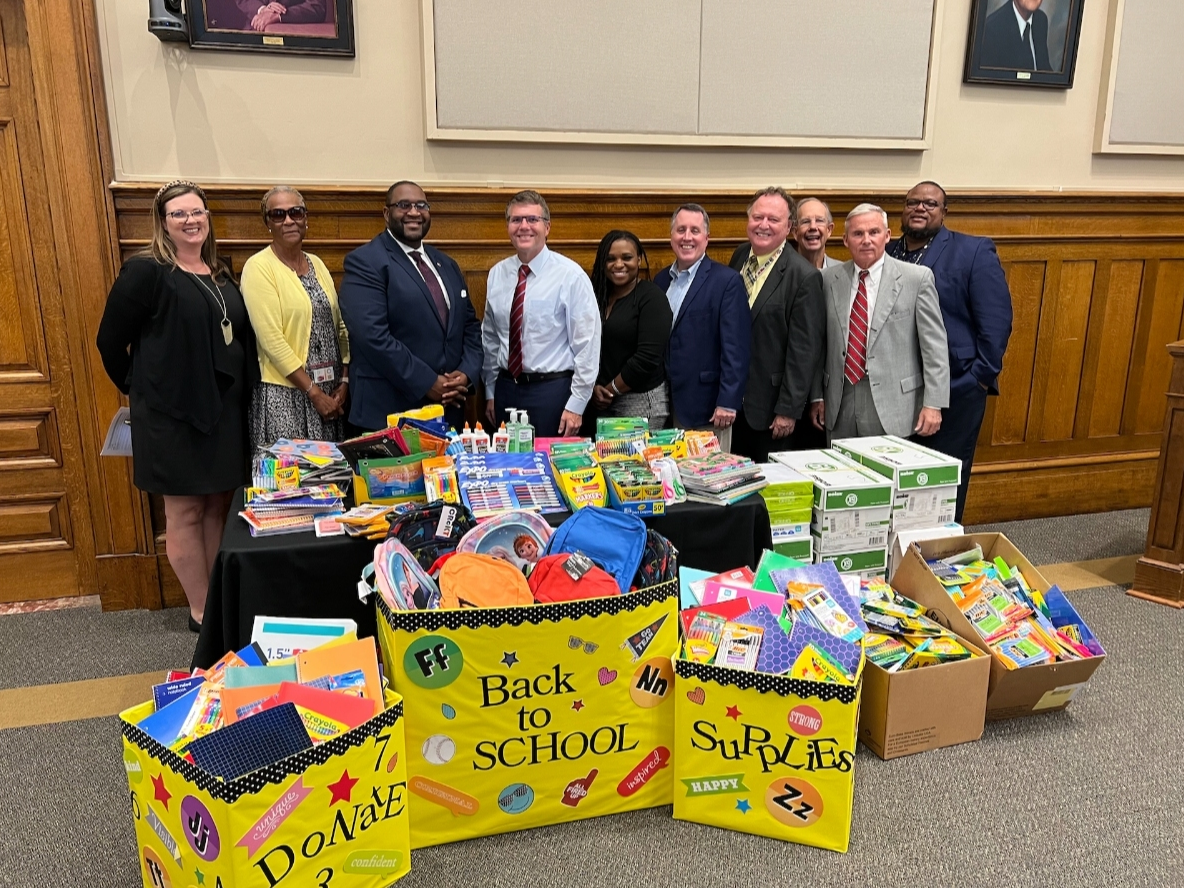 City officials stand with the items collected