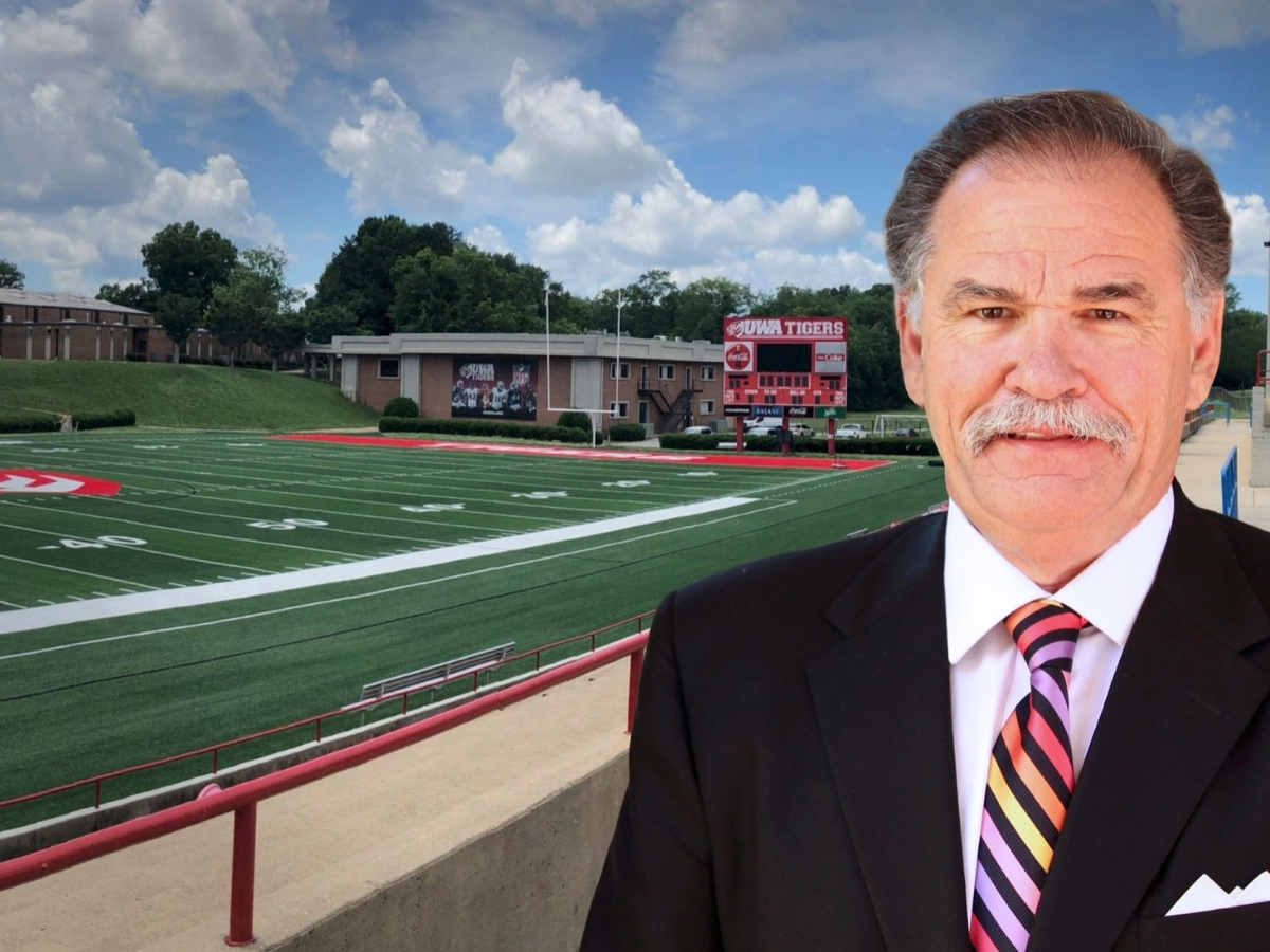Terry Bunn in front of the field at Tiger Stadium in Livingston that will soon bear his name