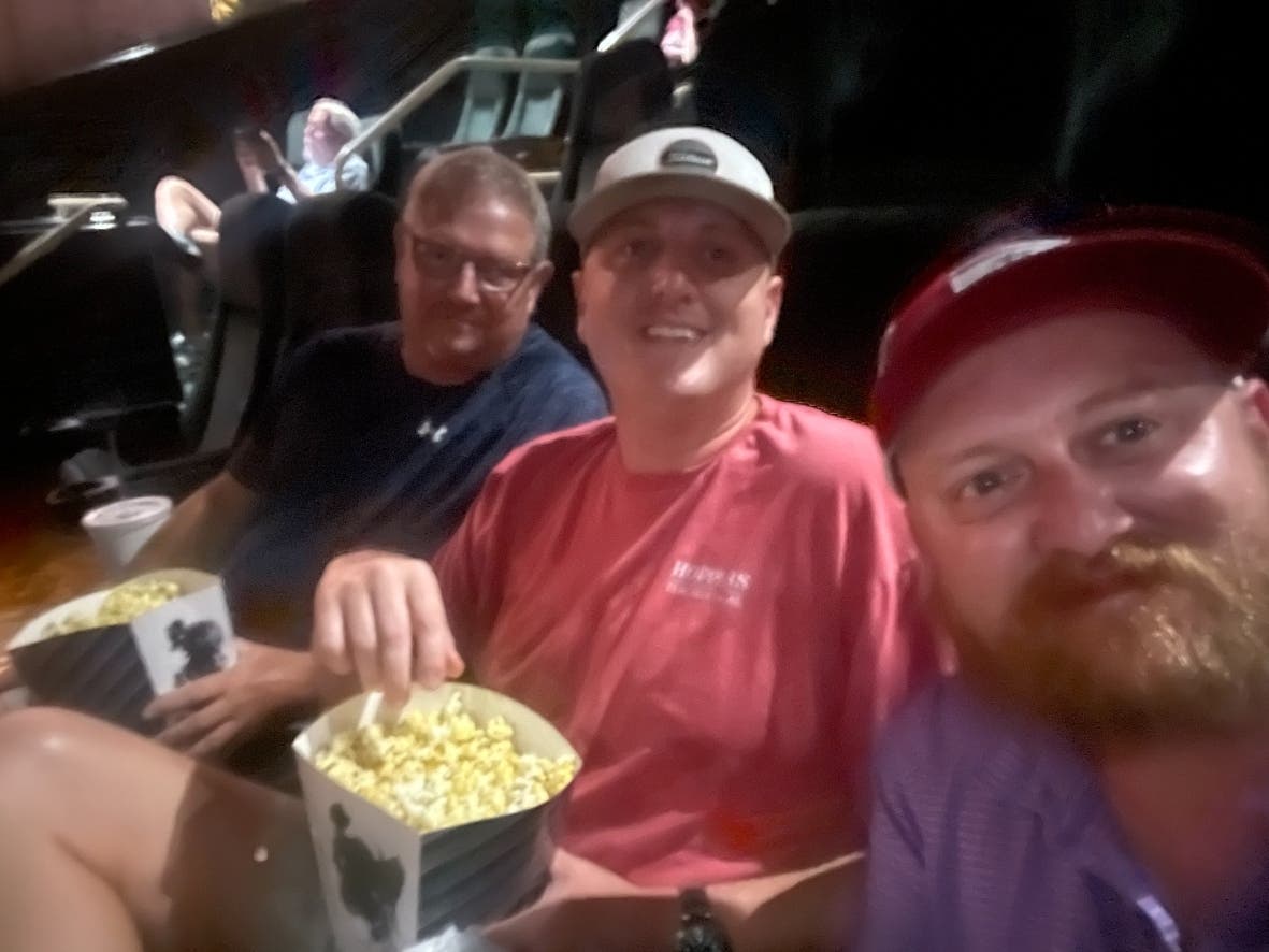 Tuscaloosa Patch founder Ryan Phillips with his brother and Dad at "Oppenheimer"