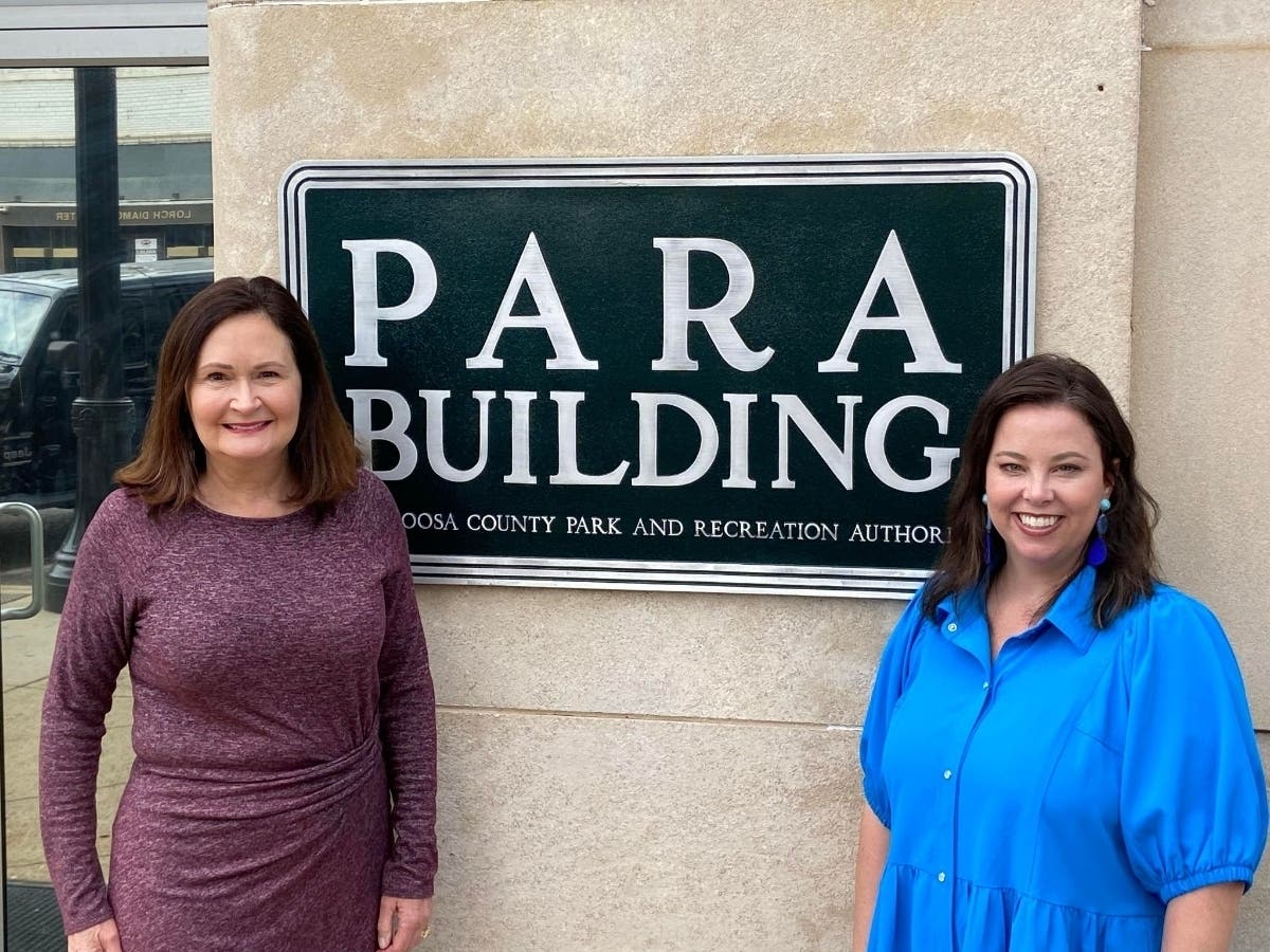 Booker, left, and Shipley stand in front of the PARA Building in downtown Tuscaloosa 