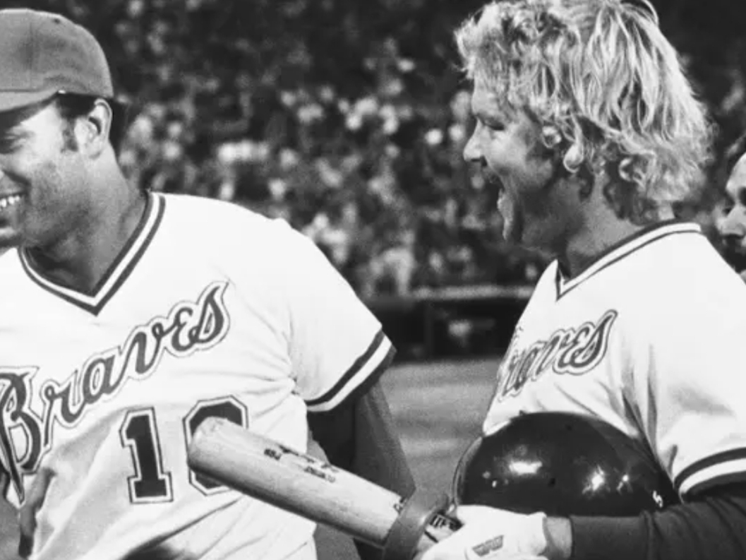 Atlanta Braves captain and third baseman Bob Horner, right, exults with teammate Chris Chambliss at Atlanta-Fulton County Stadium, April 23, 1982, after they beat the Cincinnati Reds, 4-3, in the ninth inning to keep their victory string going.