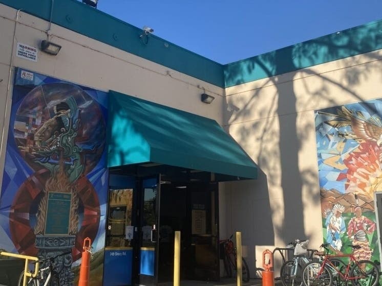 Two community murals at the entrance of Martha’s Kitchen in San Jose are pictured in this file photo from October 2025. The murals have been painted over to address the faded and peeling paint on the building, upsetting some residents.