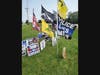 A person was numerous signs and merchandise on the side of the road off Highway 59, on the north side of North Prairie. 