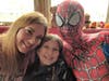 Jill (from left), Mia and Mike Justman of New Berlin. The family is big on giving back to others through the Spider-Man appearances and Mia's fundraising for the humane society of Waukesha County.