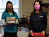  Ruzanna Amram-Paez (R), with her student extern Erica Lawler who helped sort the toys so they could be delivered to charities throughout New Jersey. 