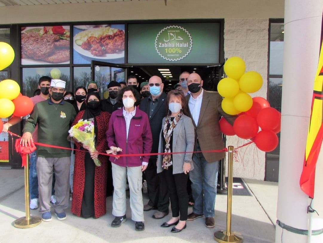 Mayor Janice Mironov, Council members Peter Yeager, Denise Daniels, Alan Rosenberg and John Zoller with owner Aslan Khan. 