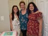 Emily Murillo with her mother Erin Popolo (center) and sister Kaylee (left).