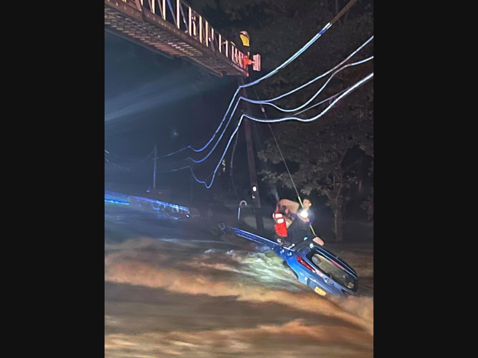 This image shows the Trenton Fire Department rescuing a motorist on Rt. 206 in the area of Quaker Road On Wednesday night. 