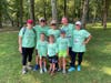 Artie Bifulco with his family after participating in a run for the Om Foundation. 