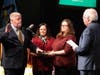 County Commissioner Charles Kenny takes the oath of office. 