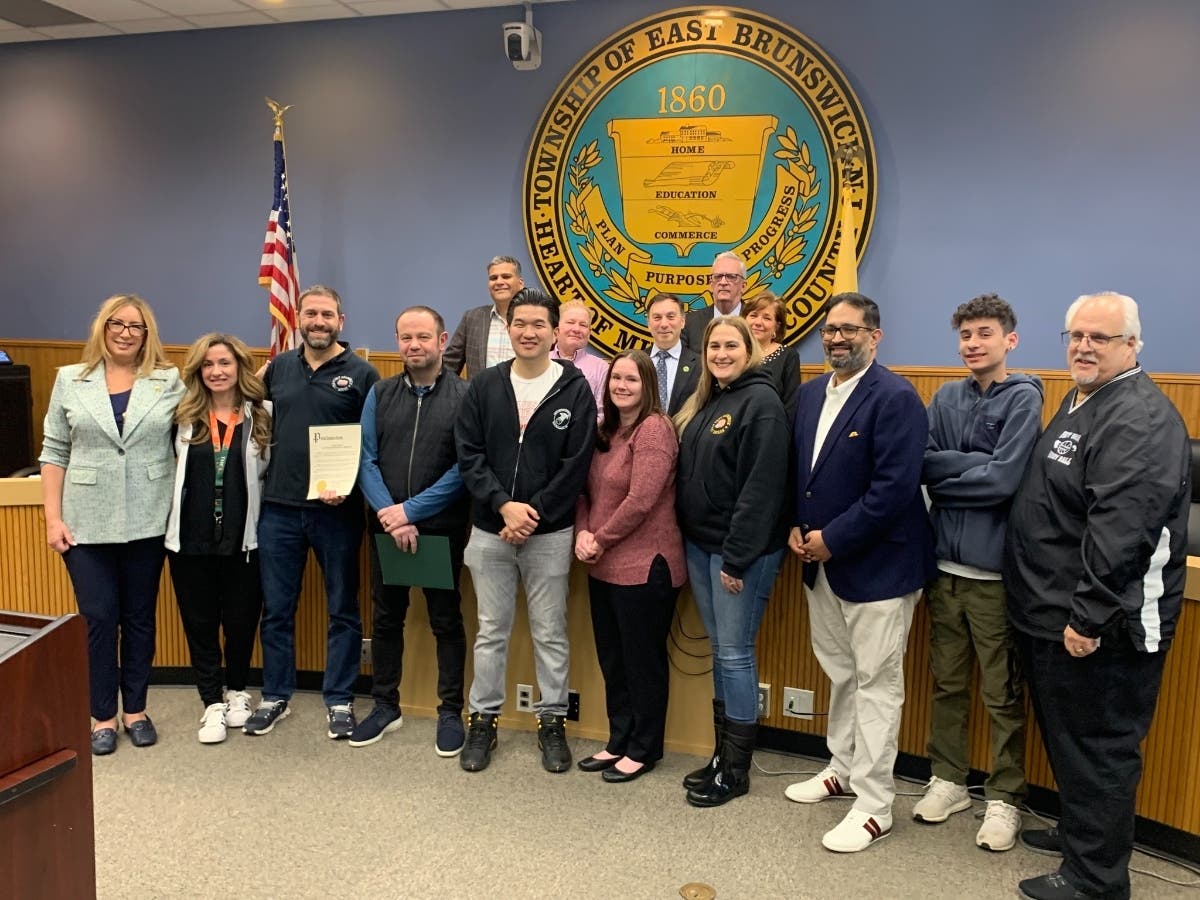 Members of Fast Break Basketball with the Mayor and Council members. 