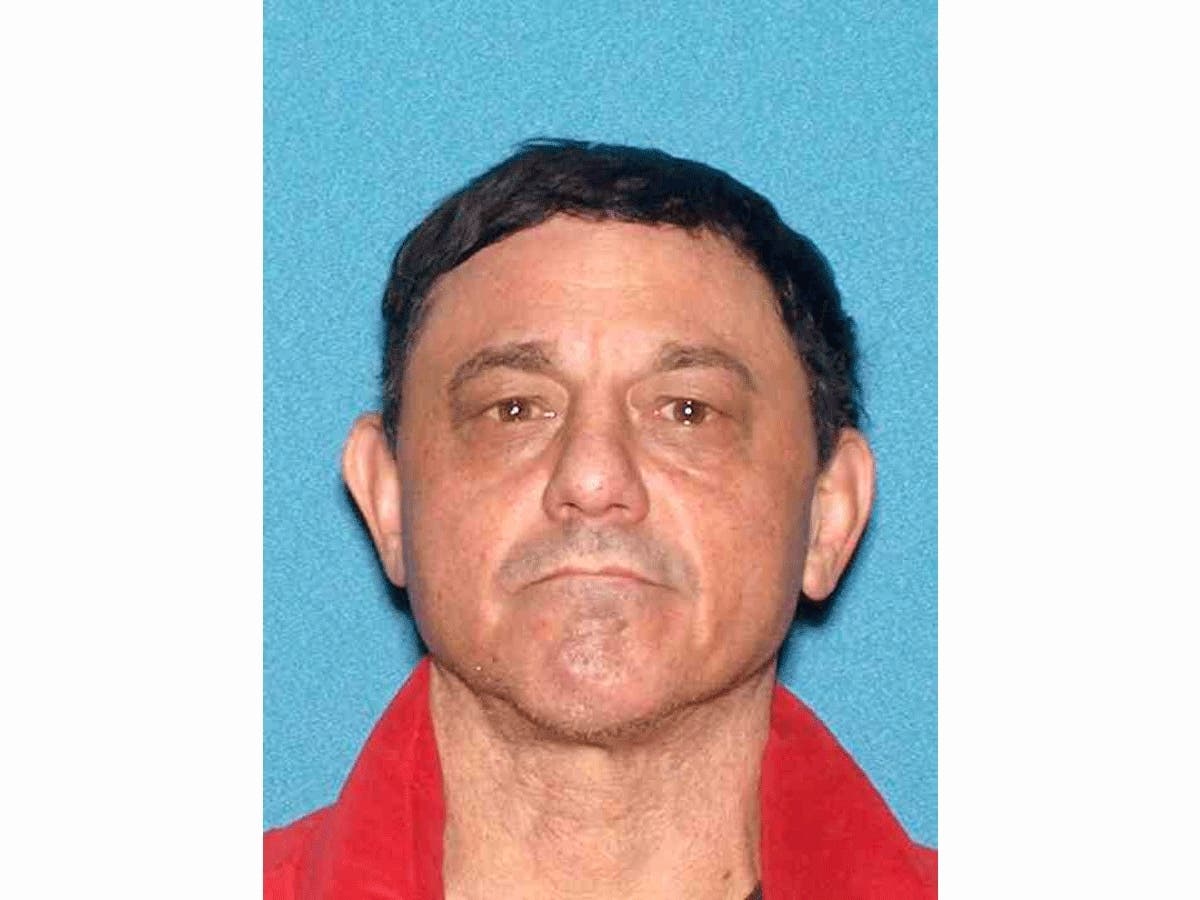 John Alfinito may be driving a 2003 silver Mercury Sable.