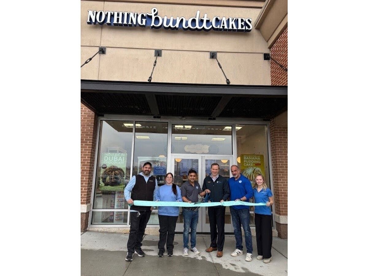 Mayor Jeff Martin with community members and local officials during the ribbon cutting ceremony. 