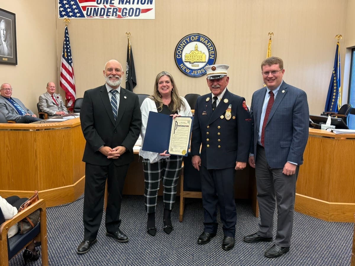 L-R: Warren County Commissioner Jason J. Sarnoski, Commissioner Director Lori Ciesla, Fire Marshal Joseph F. Lake, Jr., and Commissioner James R. Kern III