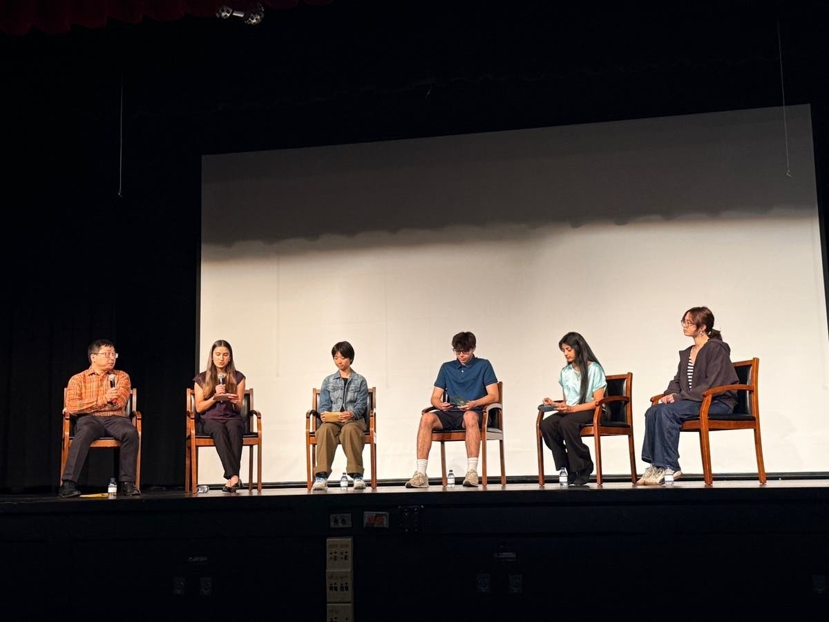Jamie Ding with Lawrence School District students