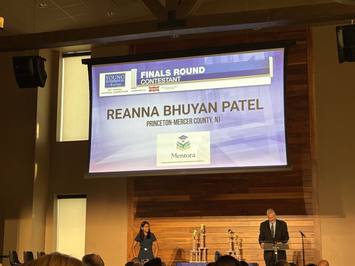 Reanna Bhuyan Patel pitches her company, Mentora, to a panel of investors. 