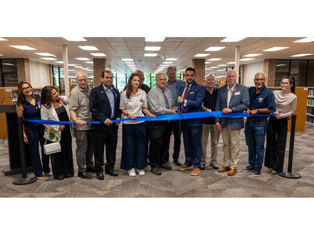 Mayor Joshi, Edison Library Board Trustees, and Dignitaries Cut the Ribbon in Celebration of the Grand Reopening of the North Branch Edison Public Library