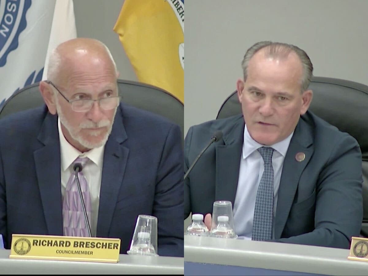Richard Brescher and Joe Coyle during Monday's meeting