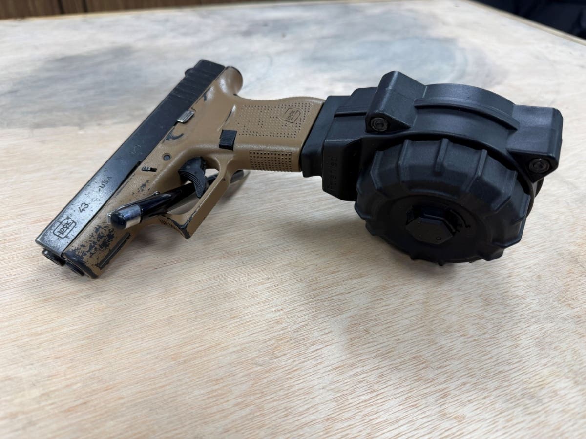 The seized Glock with drum magazine