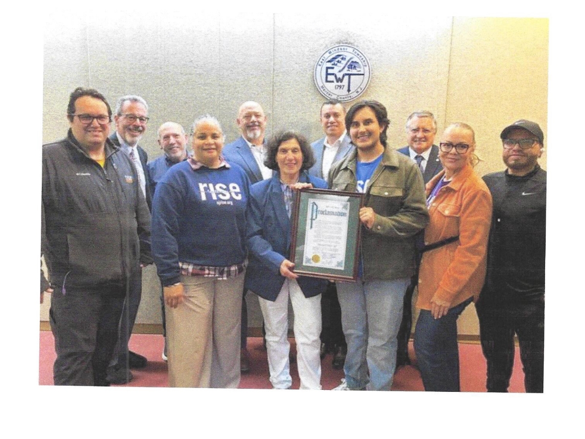 Mayor Janice Mironov and Council members present the proclamation to community members