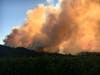 Smoke billows from the hills above St. Helena from the Glass Fire, burning in Napa County. 