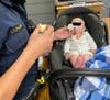 California Highway Patrol officers looked after a baby Saturday afternoon as the child's mother was arrested on suspicion of DUI and child endangerment.