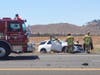 Rescue crews had to free at least one person from a wrecked vehicle following a three-car collision that sent debris flying all over Highway 79 in Murrieta on Sunday. 