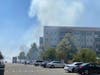 A blaze near a large Santee apartment complex shrouded the area and nearby vegetation in smoke.
