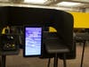 A voting machine sits idle at the CSU-Long Beach Walter Pyramid in Long Beach, Calif. 