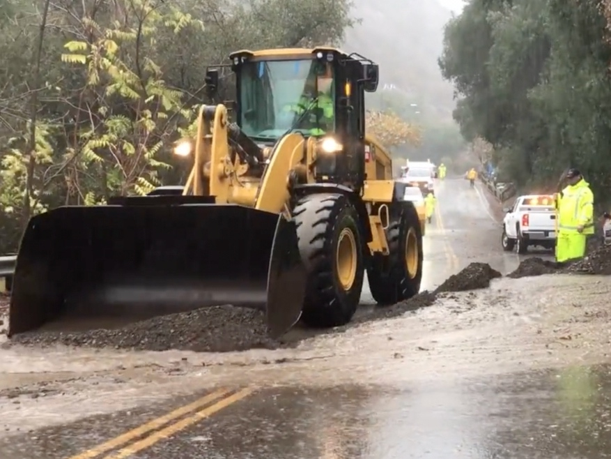 Crews work to mitigate flooding in Silverado Canyon on Tuesday. 