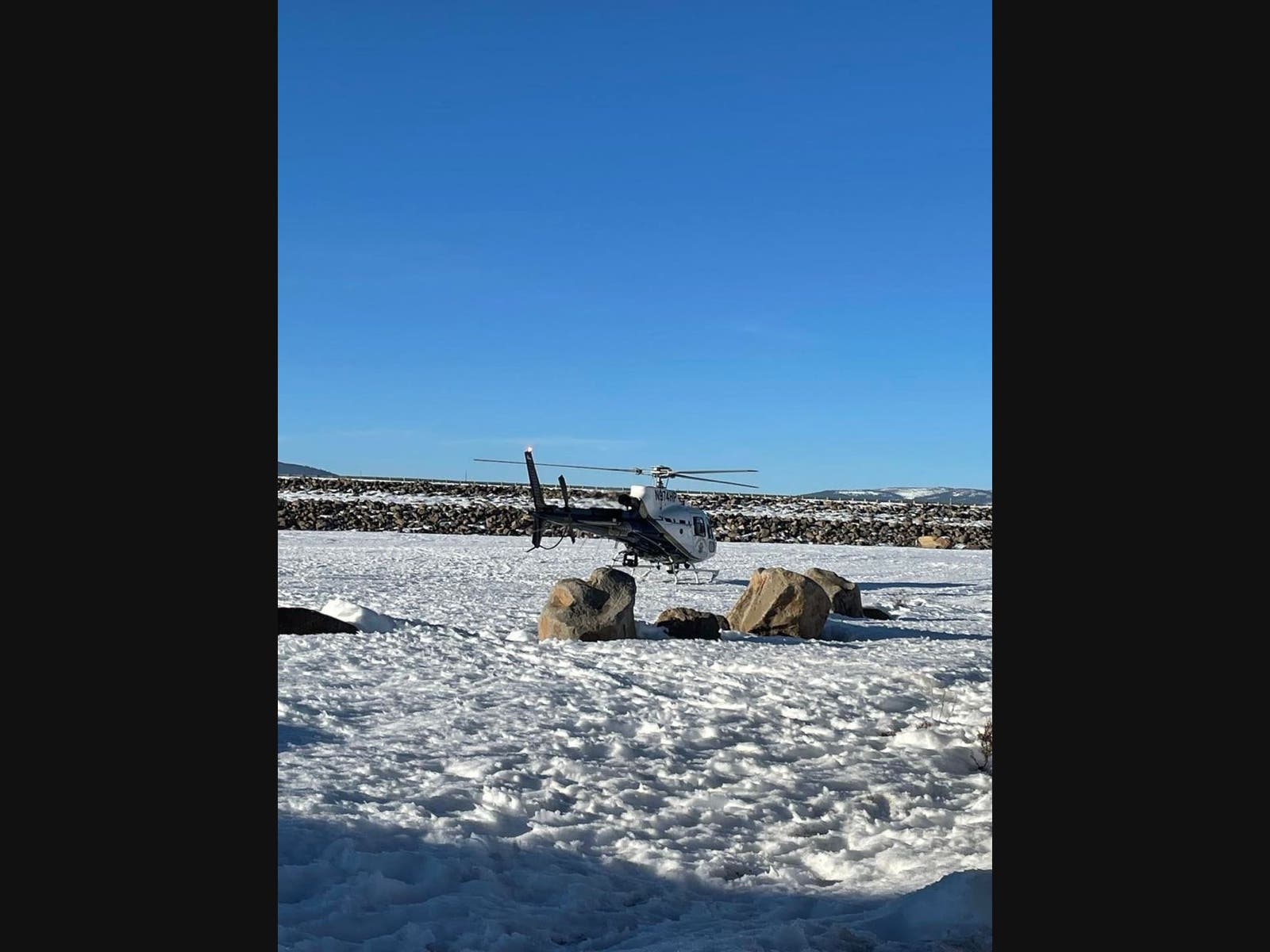 One person went missing after a group of people fell through a frozen-over reservoir in Northern California on Saturday, officials said.