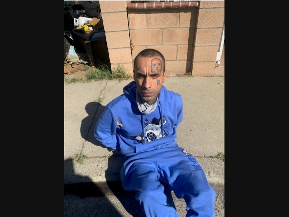 Jason Anthony Rhine during his arrest last year. 