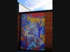 April Bleakney’s public mural graces the wall of Fifth Third Bank.