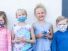 Friends and neighbors Emily K., Addison N., Audrey P., and Edison K., enjoying the festivities at Nak4 Orthodontics on June 10th. 
