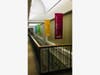 Bright new signage enlivens visitors' experience and helps to identify program locations at the Community House.