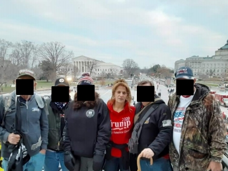 In this now-deleted photo from Sandy Pomeroy Weyer's Facebook page, Weyer is seen standing outside the Capitol on Jan. 6, 2021. Surveillance footage shows her inside the Capitol during the Jan. 6 riots, according to federal investigators.