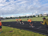Coach Andy Weiss, sprints coach, runs the boys sprints practices.