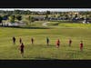 Coach Gerald Houston, distance coach, leads the cross country team during a hill workout.