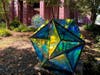 "Star & Spheres" by Ray King, currently on view at Summit City Hall. Made of plexiglass coated with a metallic film developed by NASA, the sculptures both reflect and project a variety of light and colors throughout the day. 
