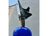 "Surface Tension," a whimsical, mind-bending sculpture by Charlie Spademan at Kaus Way in downtown Summit. 