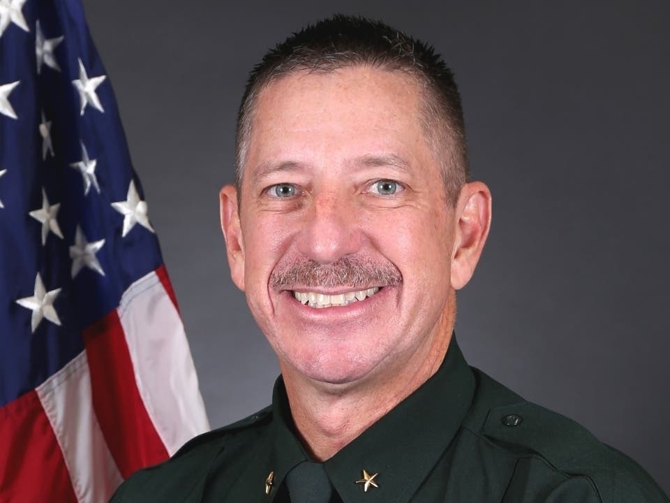 In a public letter, Sarasota County Sheriff Kurt Hoffman explained how he took a photo with a QAnon follower on the campaign trail, and blamed the media for divisiveness.
