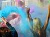 LGBTQ activists used colored corn starch to create a stream of color off the Ringling Causeway Bridge Saturday.