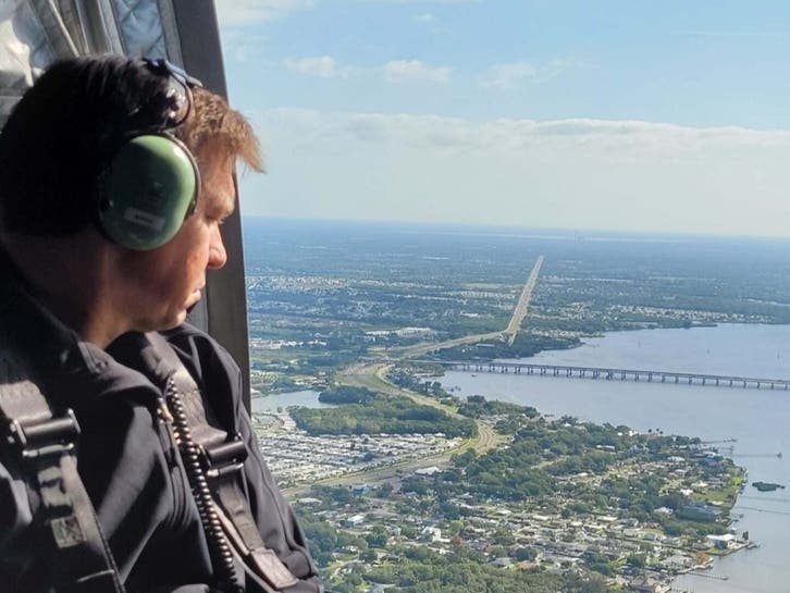 Florida Gov. Ron DeSantis tours the Piney Point reservoir by helicopter. He's included as a defendant in a lawsuit filed by area conservation groups.