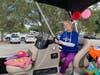 Make-A-Wish Southern Florida gave a pontoon boat to Sarasota teen, Charisa, who struggles with Angelman Syndrome and epilepsy, and her family. 